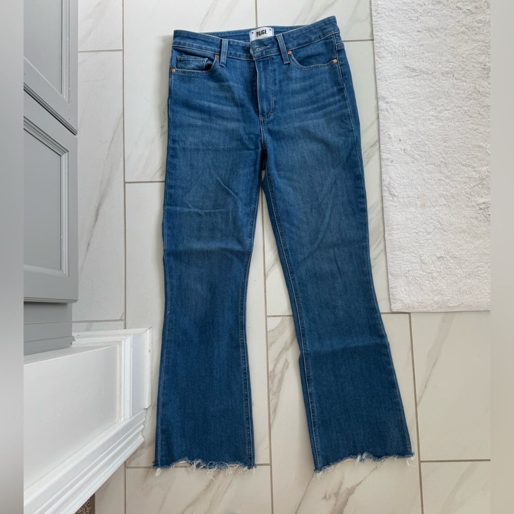 PAIGE Flare Jeans with Distressed Hem in Blue Style: Claudine